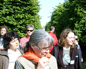 A group of meeting attendees gathered outdoors
