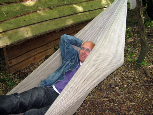 A person relaxing in a hammoc